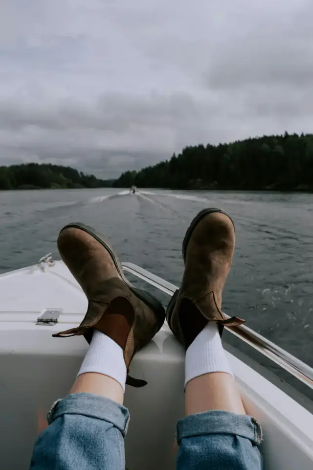 Boots resting on the bow of a boat